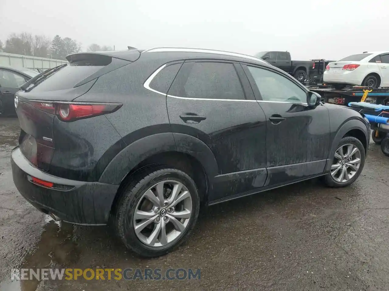 3 Photograph of a damaged car 3MVDMBDL5MM300964 MAZDA CX30 2021