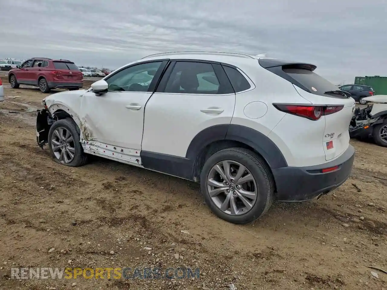 2 fotografías del automóvil dañado 3MVDMBDLXMM212265 MAZDA CX30 2021
