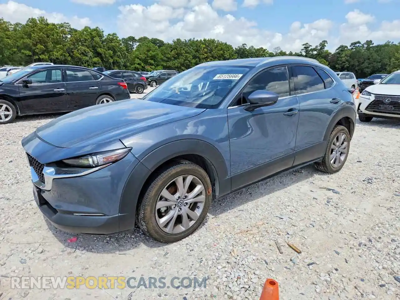 1 Photograph of a damaged car 3MVDMBDLXMM306713 MAZDA CX30 2021
