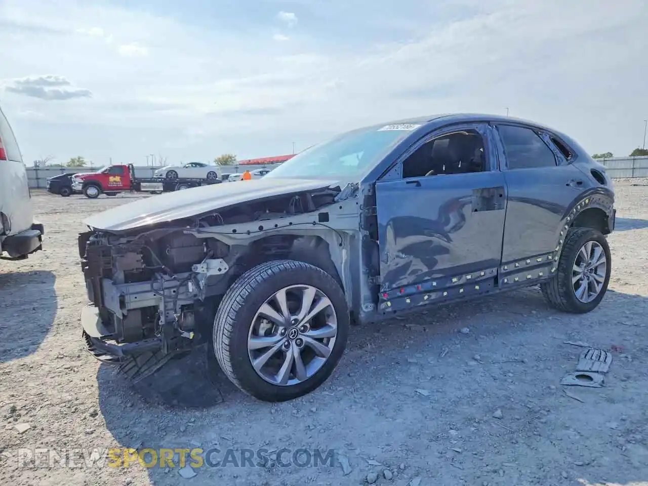 1 Photograph of a damaged car 3MVDMBDY7MM309094 MAZDA CX30 2021