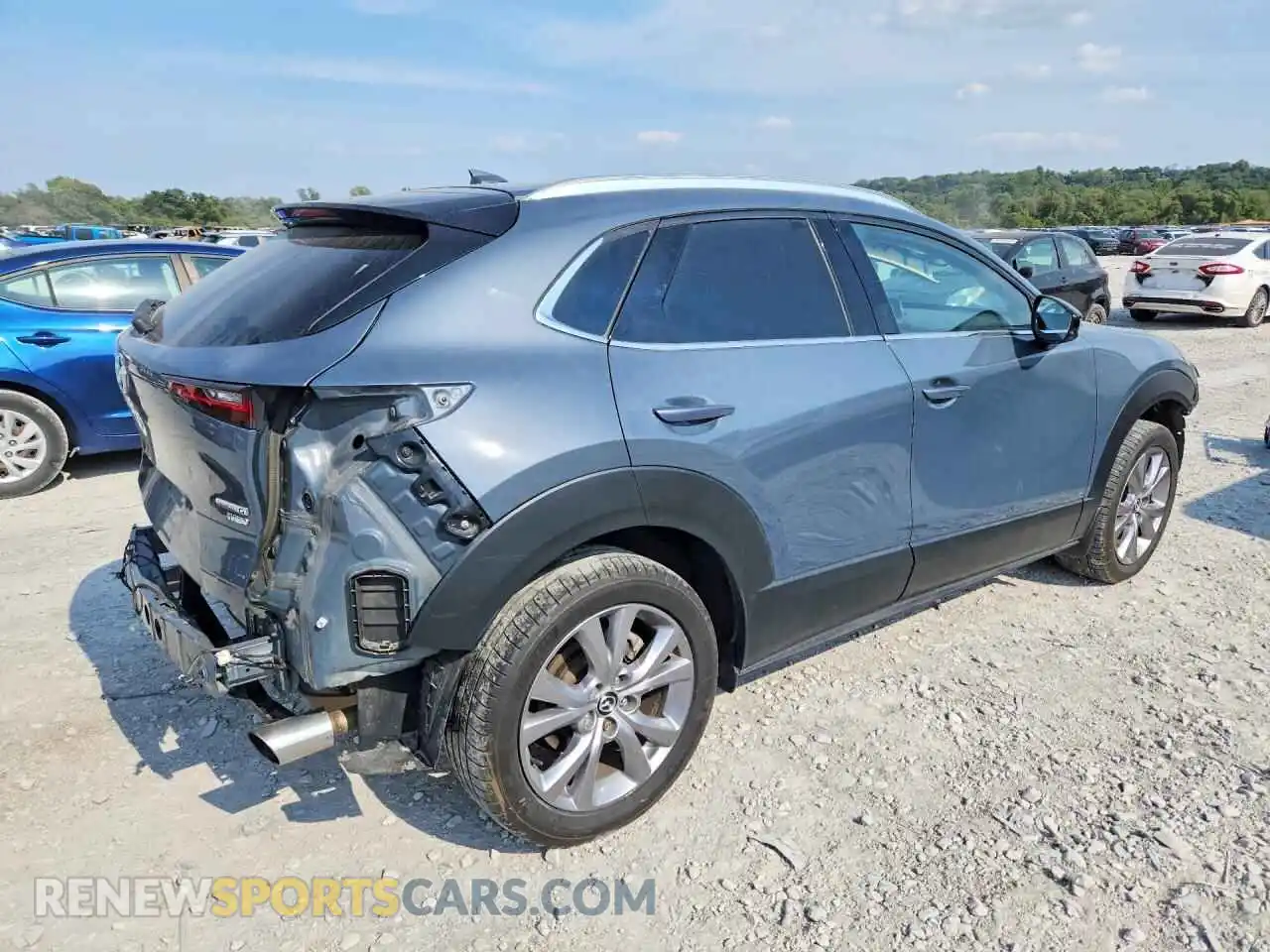 3 Photograph of a damaged car 3MVDMBDY7MM309094 MAZDA CX30 2021