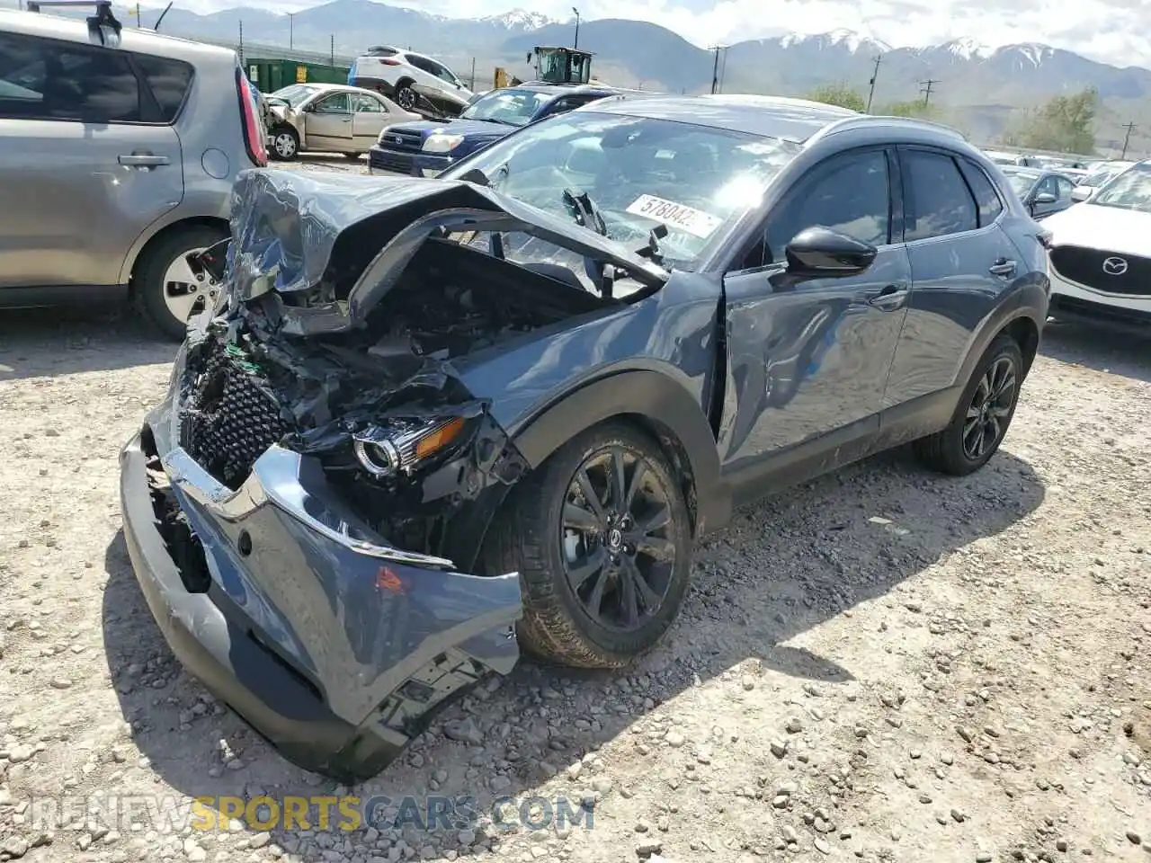 1 Photograph of a damaged car 3MVDMBEY2MM255542 MAZDA CX30 2021