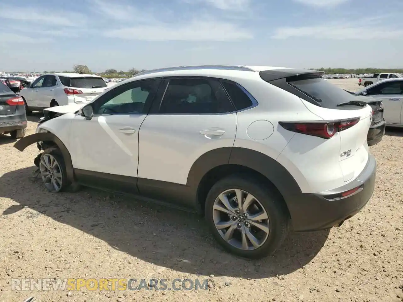 2 Photograph of a damaged car 3MVDMBBL1NM403335 MAZDA CX30 2022