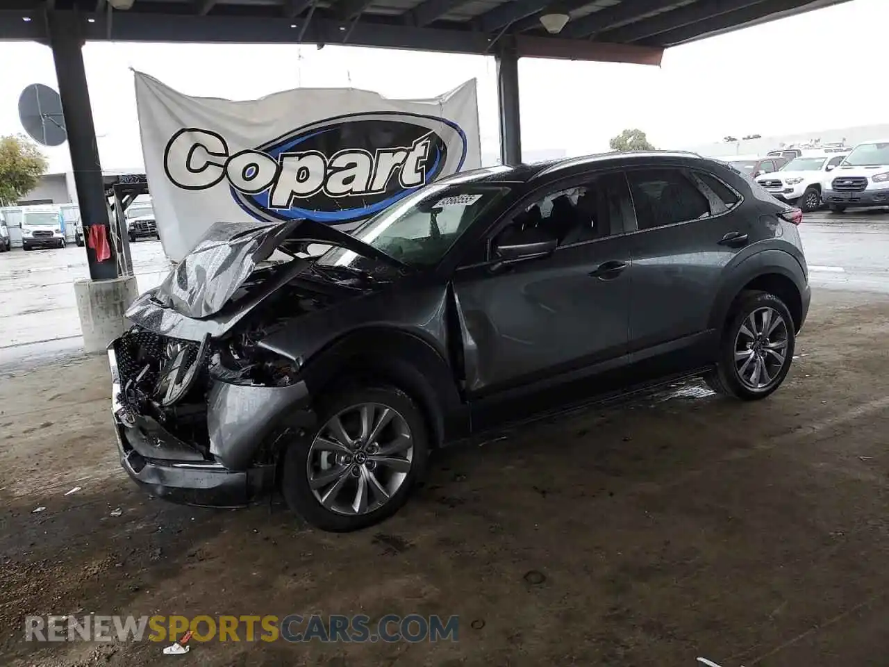 1 Photograph of a damaged car 3MVDMBBLXNM411689 MAZDA CX30 2022