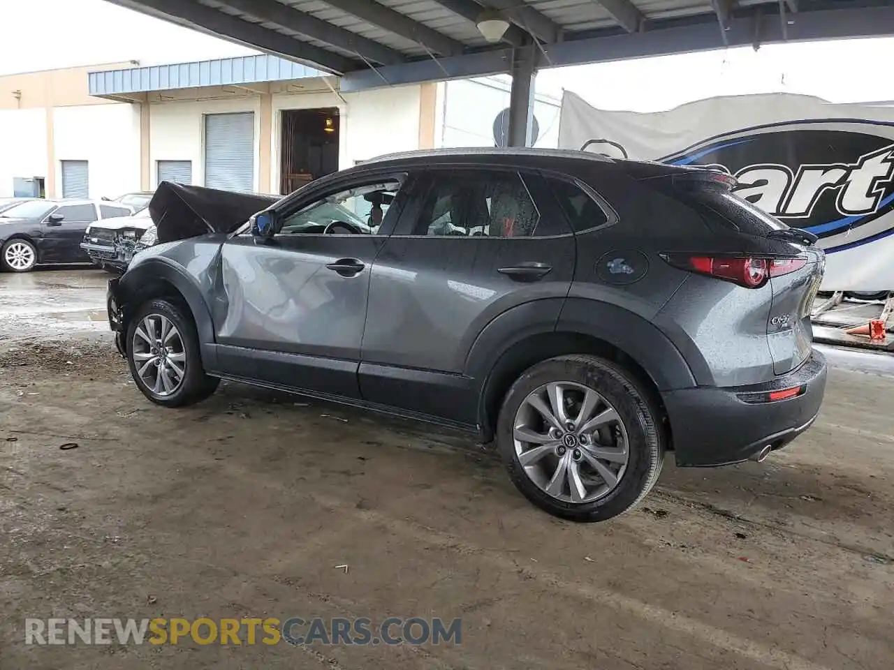 2 Photograph of a damaged car 3MVDMBBLXNM411689 MAZDA CX30 2022