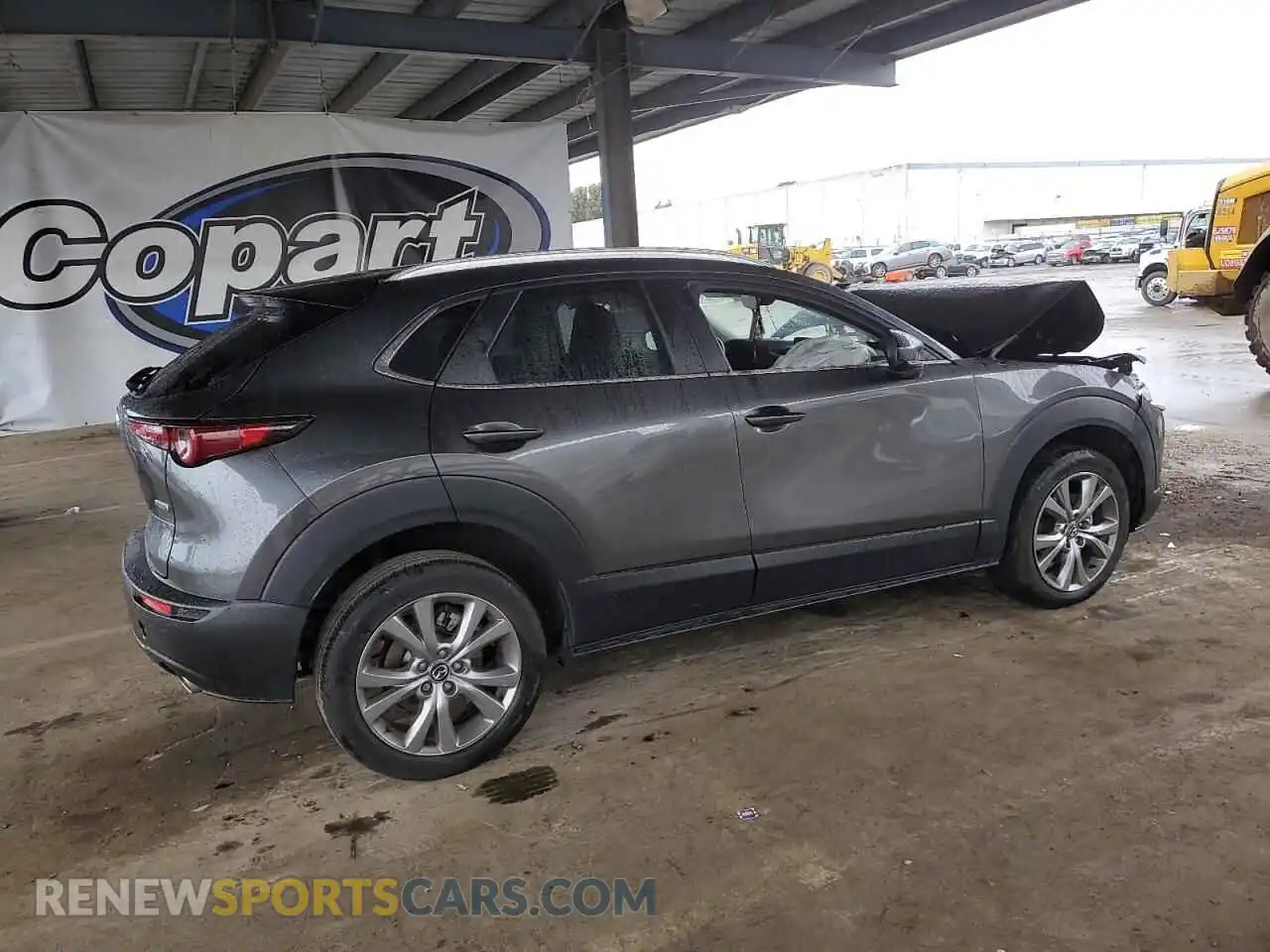 3 Photograph of a damaged car 3MVDMBBLXNM411689 MAZDA CX30 2022