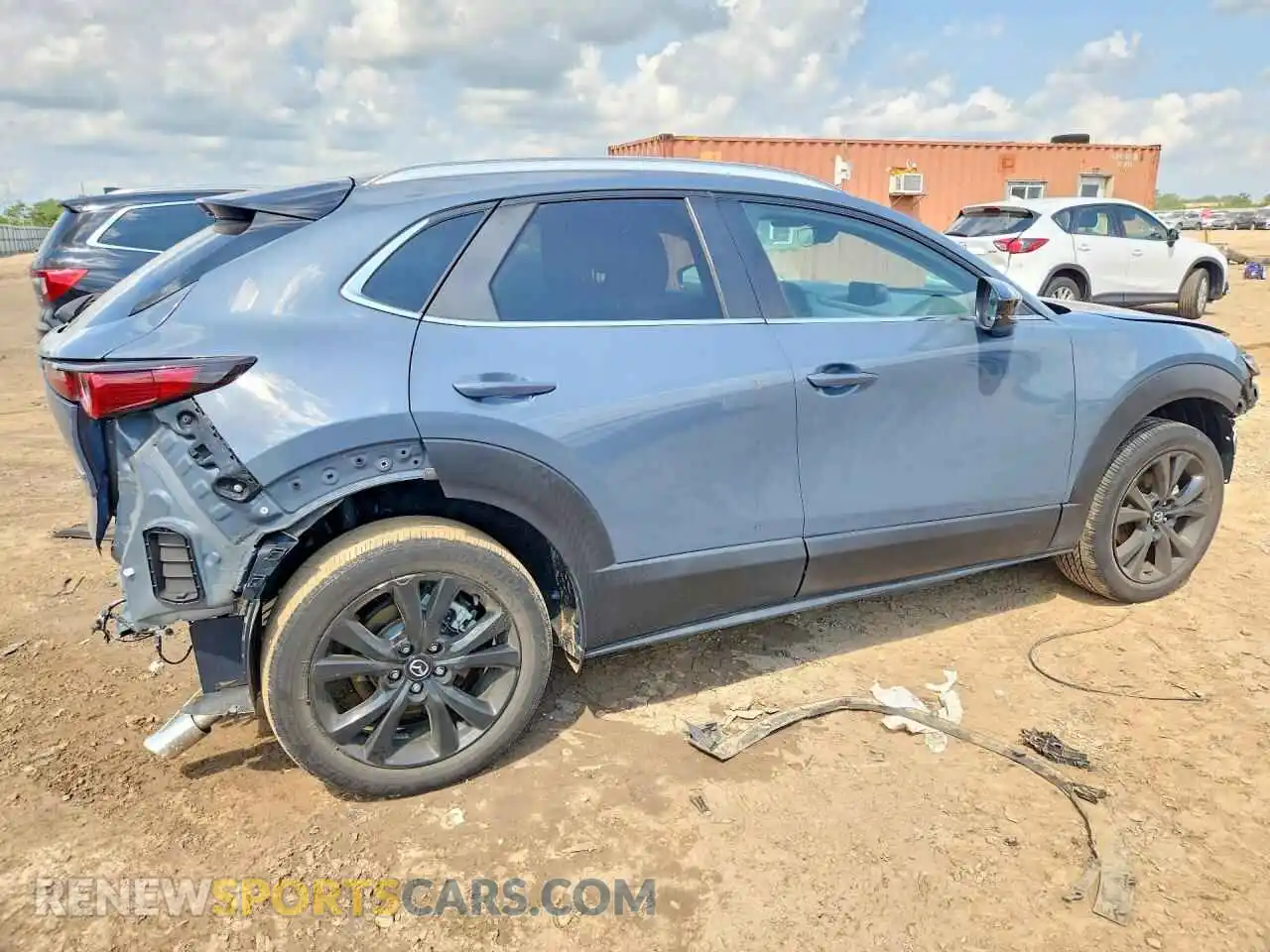 3 Фотография поврежденного автомобиля 3MVDMBCL3NM407465 MAZDA CX30 2022