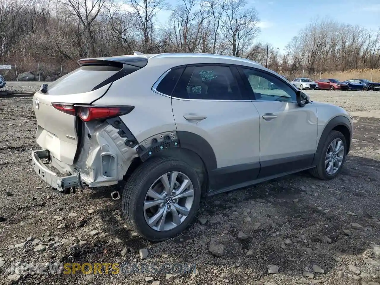 3 Photograph of a damaged car 3MVDMBDL0NM429048 MAZDA CX30 2022