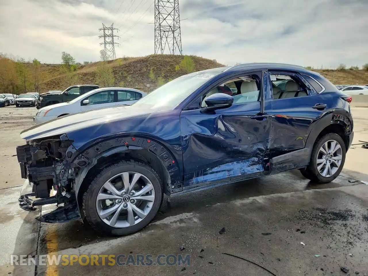 1 Фотография поврежденного автомобиля 3MVDMBDL1NM418060 MAZDA CX30 2022