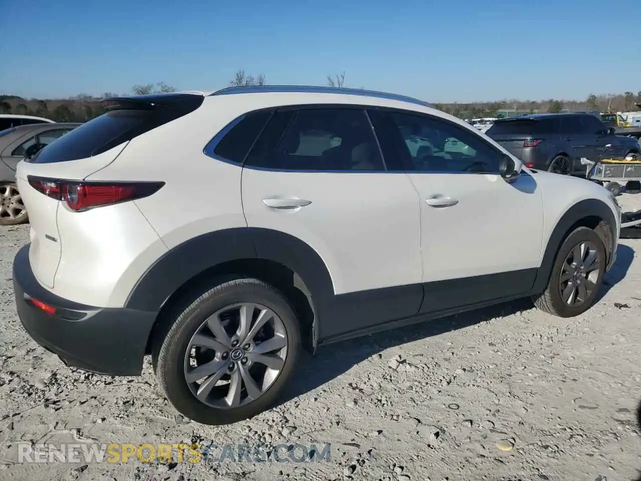 3 Photograph of a damaged car 3MVDMBDL8NM445479 MAZDA CX30 2022