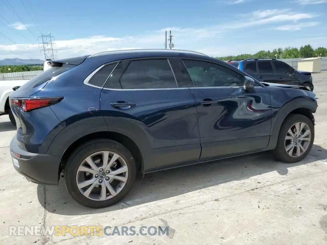 3 Photograph of a damaged car 3MVDMBDL9NM446527 MAZDA CX30 2022