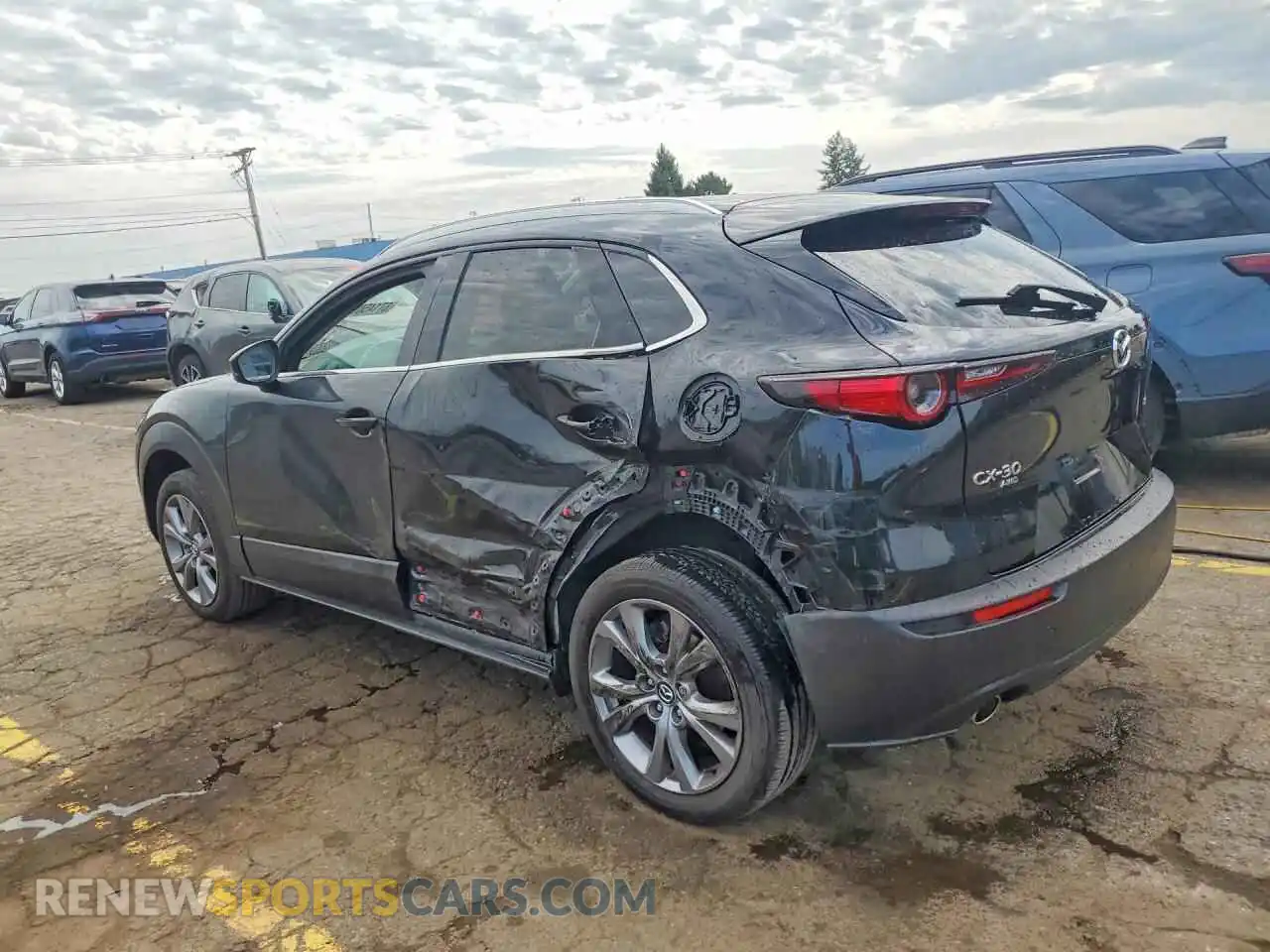 2 fotografías del automóvil dañado 3MVDMBDL9NM450058 MAZDA CX30 2022