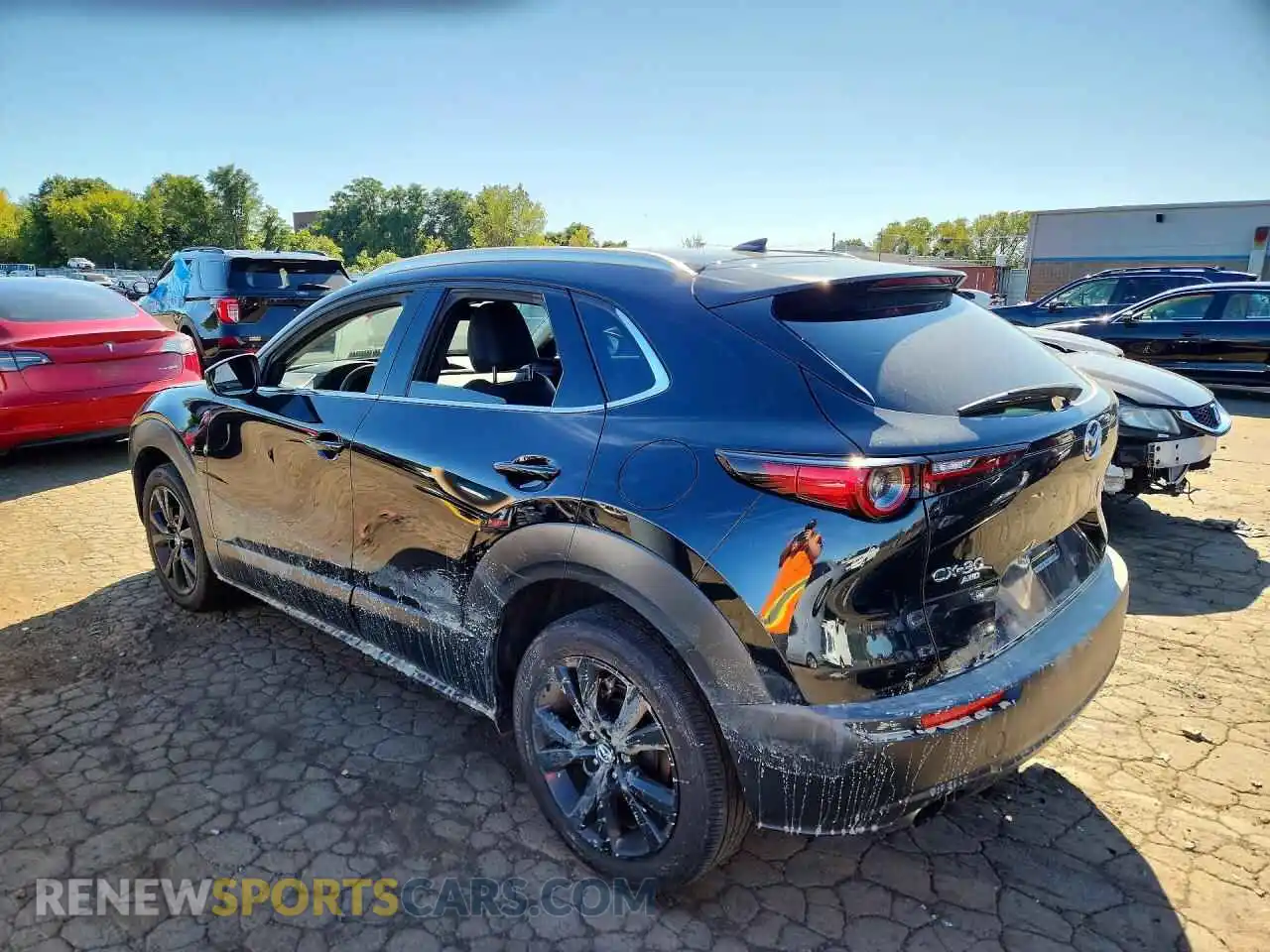 2 fotografías del automóvil dañado 3MVDMBDY1NM407961 MAZDA CX30 2022