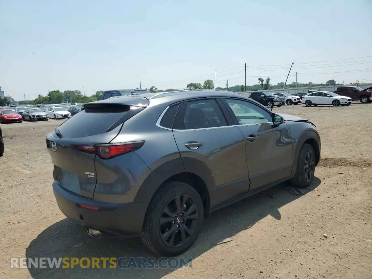3 Фотография поврежденного автомобиля 3MVDMBDY3NM459656 MAZDA CX30 2022