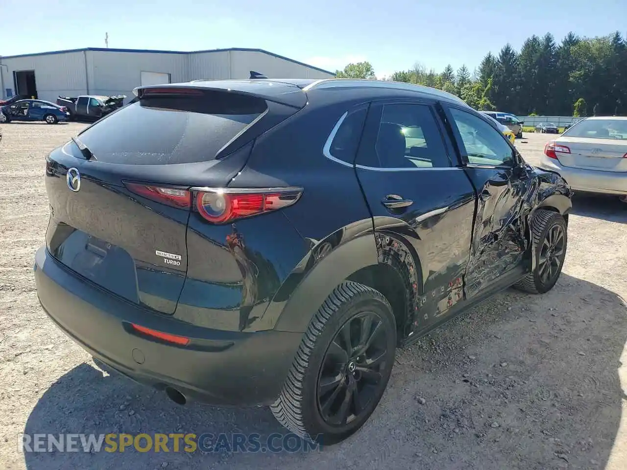 3 Фотография поврежденного автомобиля 3MVDMBDY5NM412886 MAZDA CX30 2022