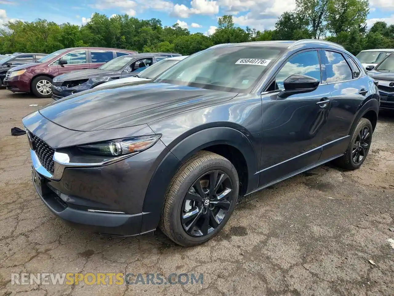 1 Photograph of a damaged car 3MVDMBDY6NM459277 MAZDA CX30 2022