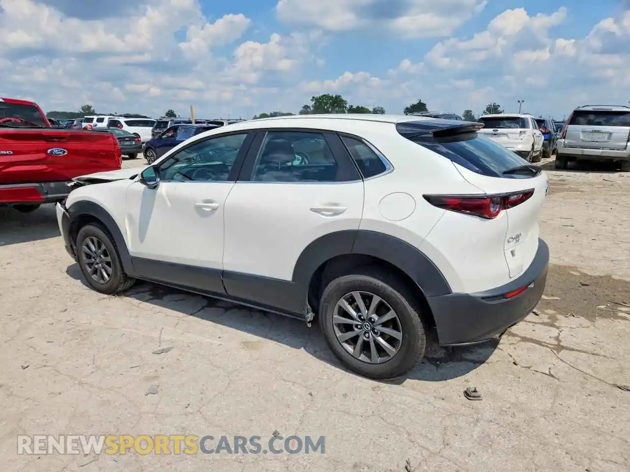 2 fotografías del automóvil dañado 3MVDMBAM9PM549947 MAZDA CX30 2023