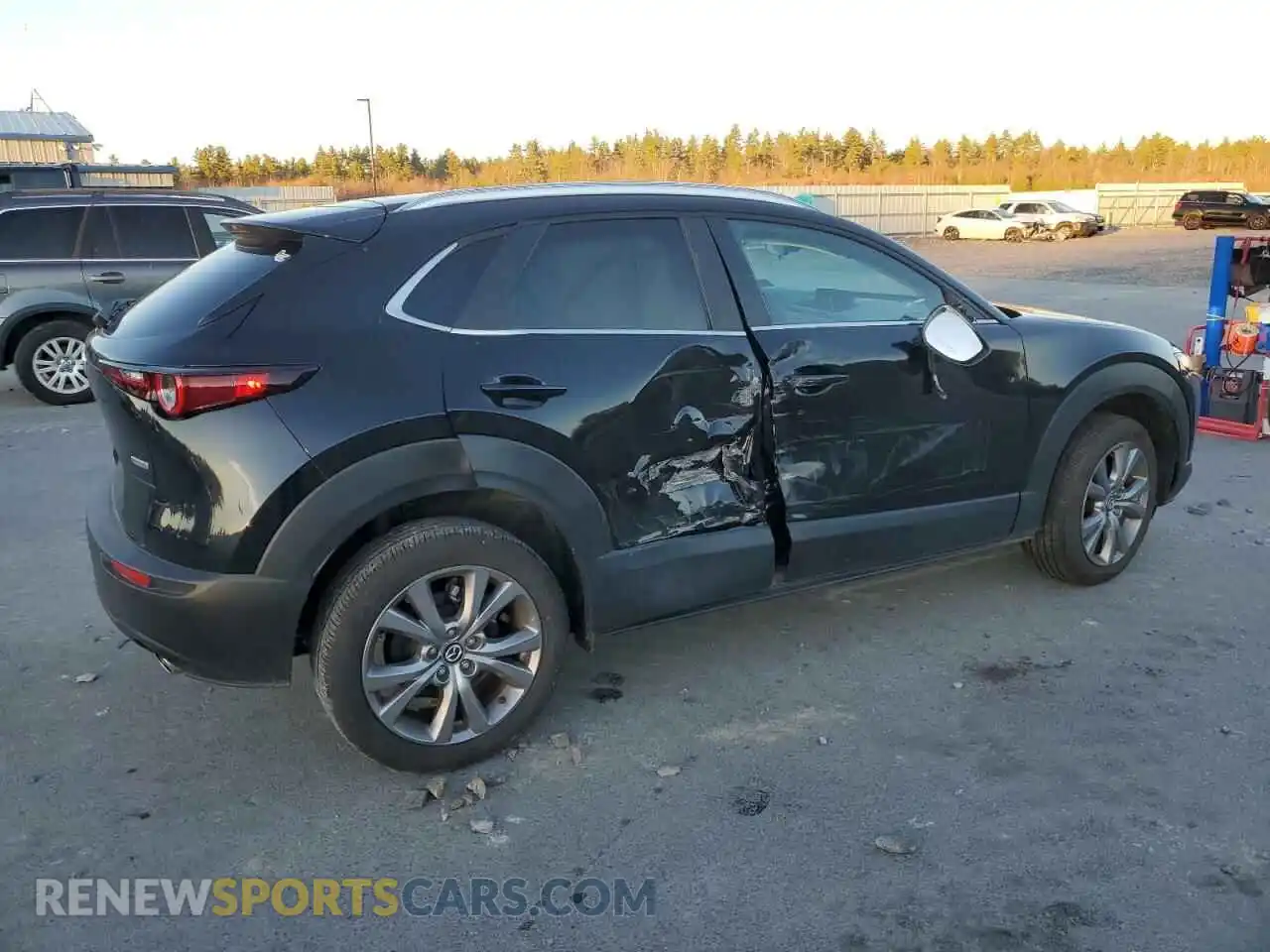 3 Photograph of a damaged car 3MVDMBBM2PM523284 MAZDA CX30 2023