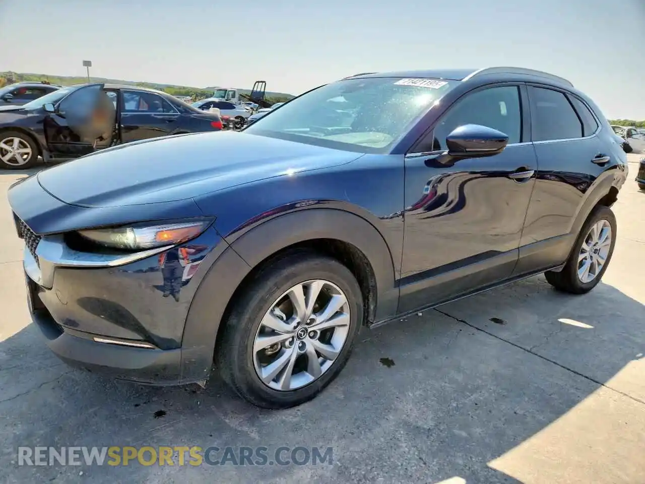 1 Photograph of a damaged car 3MVDMBBM3PM542300 MAZDA CX30 2023