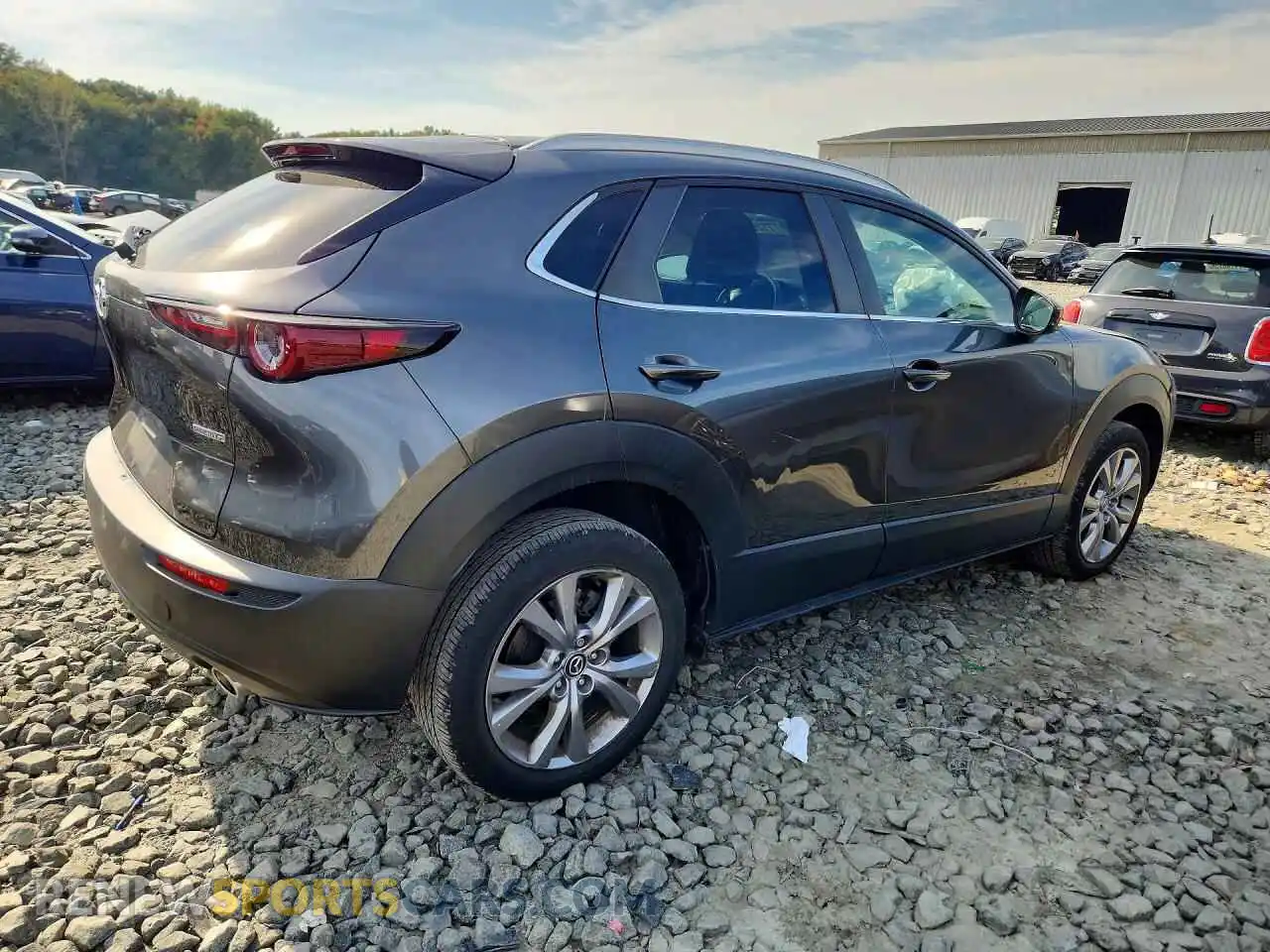 3 Фотография поврежденного автомобиля 3MVDMBBM3PM572963 MAZDA CX30 2023