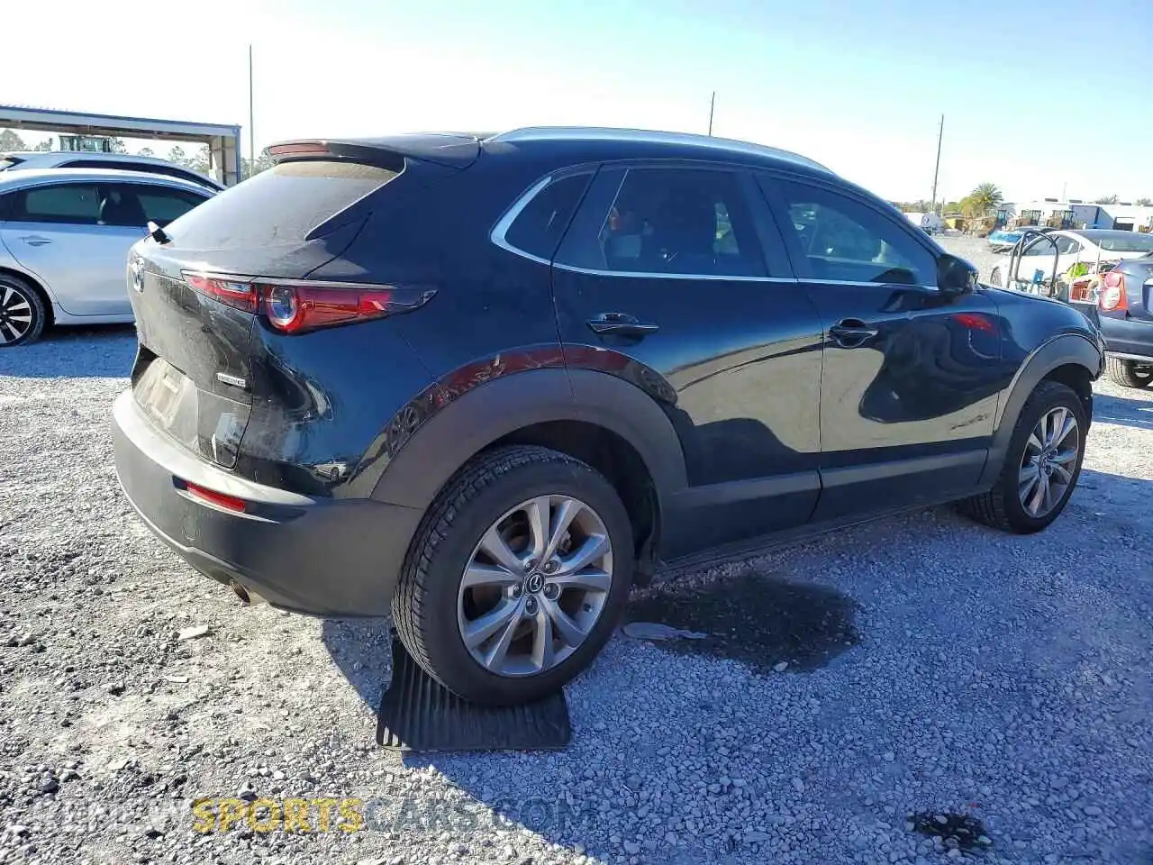 3 Photograph of a damaged car 3MVDMBBMXPM529009 MAZDA CX30 2023