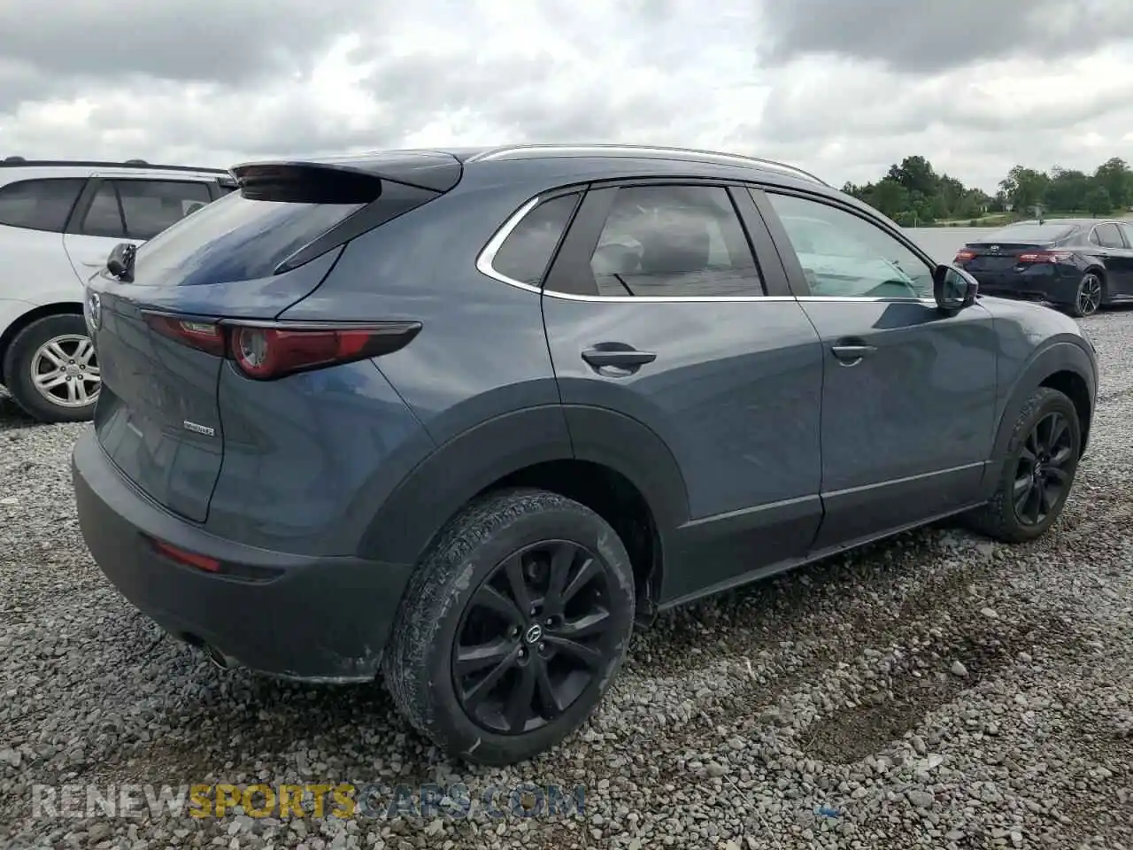 3 Photograph of a damaged car 3MVDMBCM0PM531835 MAZDA CX30 2023