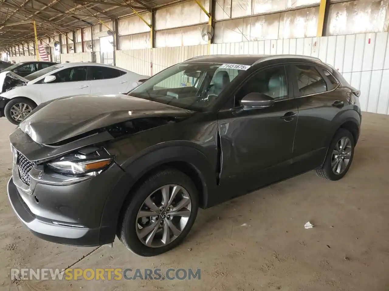1 Photograph of a damaged car 3MVDMBCM0PM579531 MAZDA CX30 2023