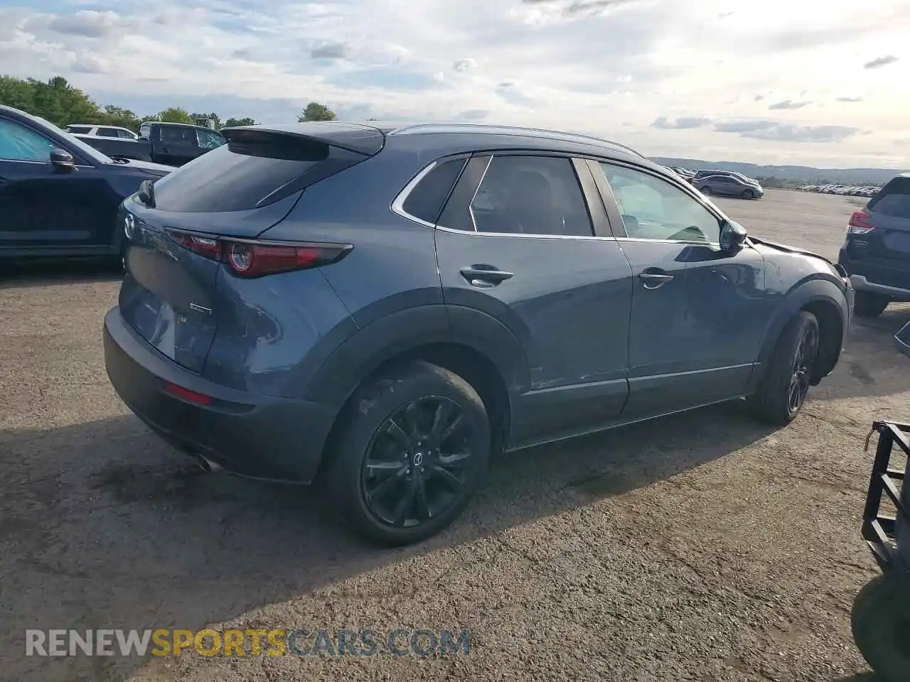 3 Фотография поврежденного автомобиля 3MVDMBCM1PM529351 MAZDA CX30 2023