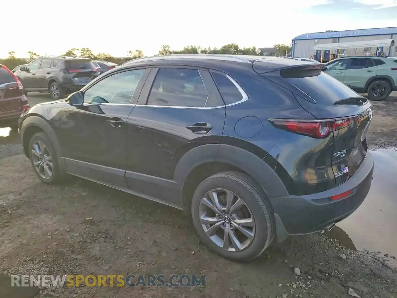 2 Photograph of a damaged car 3MVDMBCM2PM579207 MAZDA CX30 2023