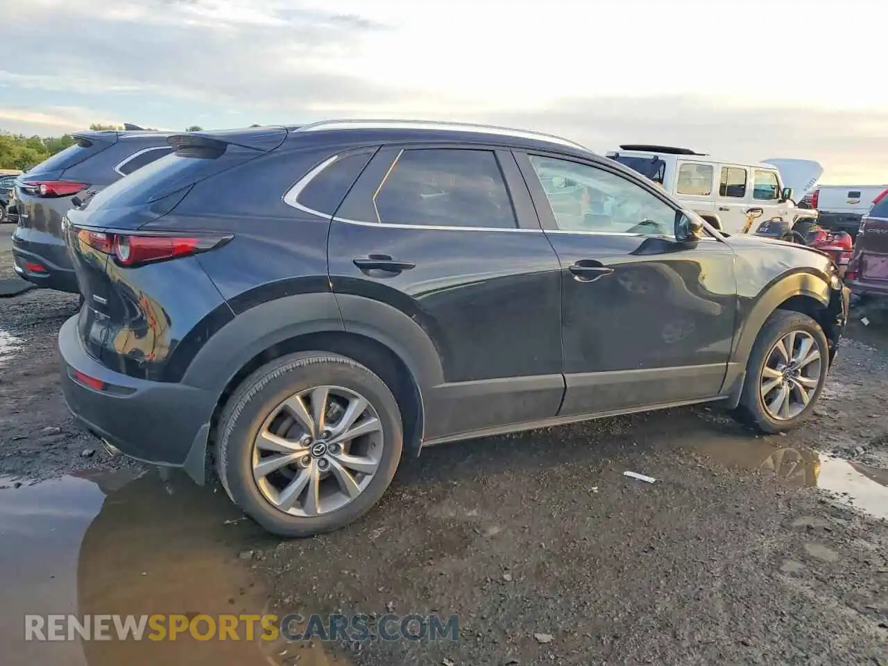 3 Photograph of a damaged car 3MVDMBCM2PM579207 MAZDA CX30 2023
