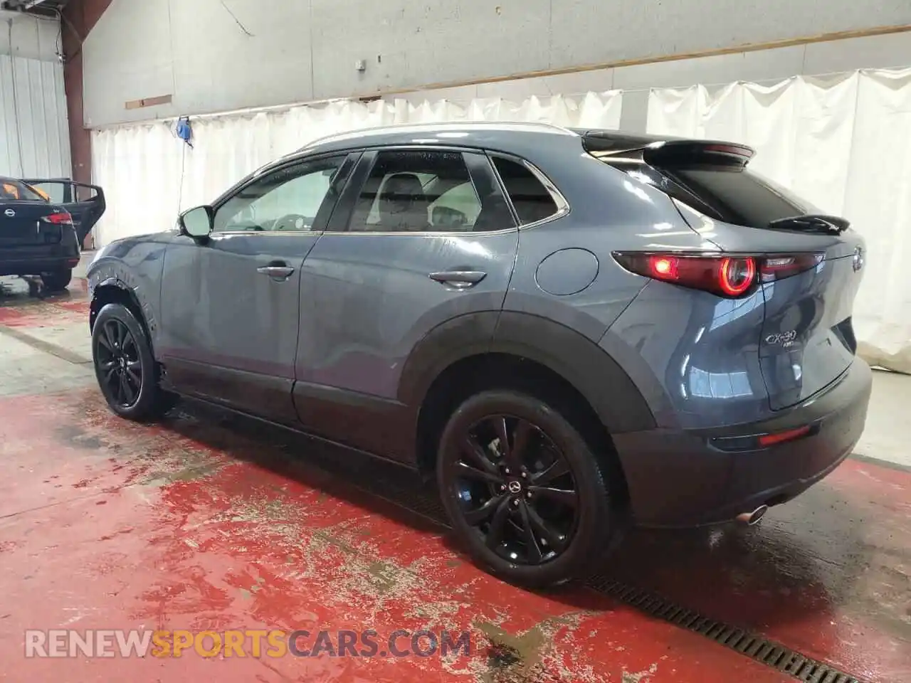 2 Photograph of a damaged car 3MVDMBCM3PM532381 MAZDA CX30 2023