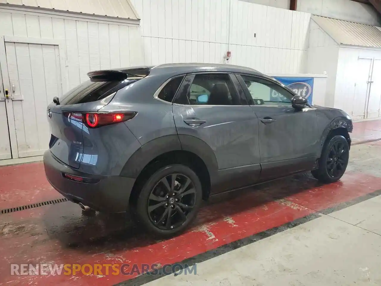 3 Photograph of a damaged car 3MVDMBCM3PM532381 MAZDA CX30 2023