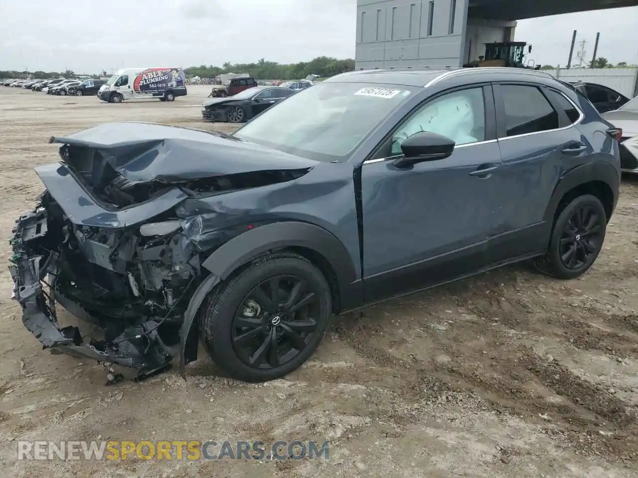 1 Photograph of a damaged car 3MVDMBCM3PM576154 MAZDA CX30 2023