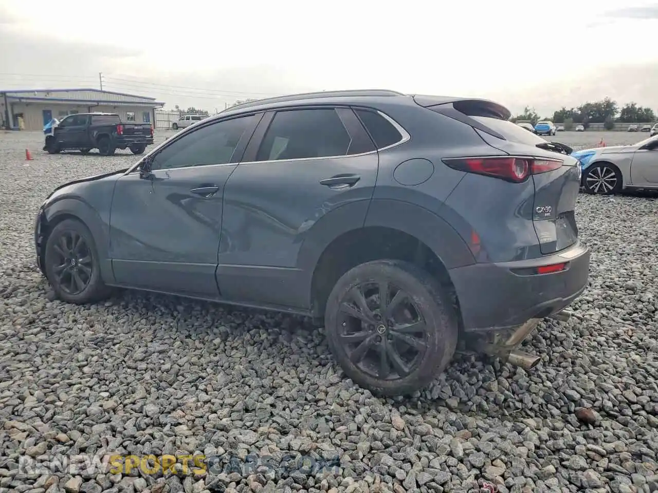 2 fotografías del automóvil dañado 3MVDMBCM4PM509787 MAZDA CX30 2023