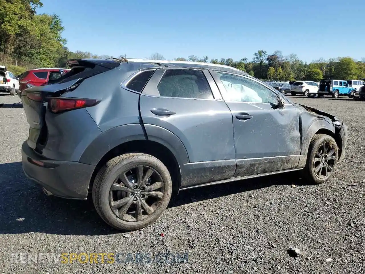 3 Фотография поврежденного автомобиля 3MVDMBCM4PM553286 MAZDA CX30 2023