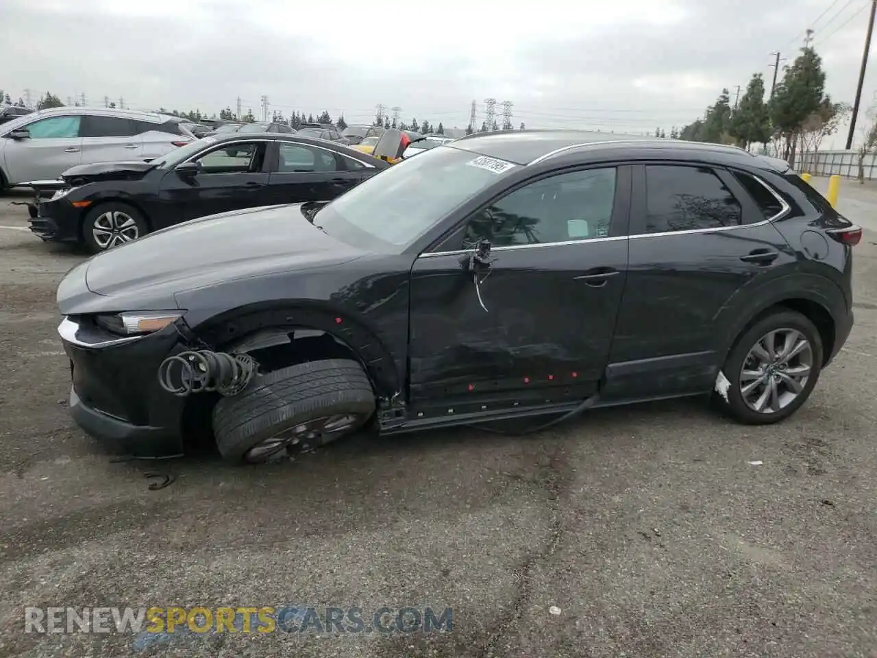 1 Photograph of a damaged car 3MVDMBCM5PM515372 MAZDA CX30 2023