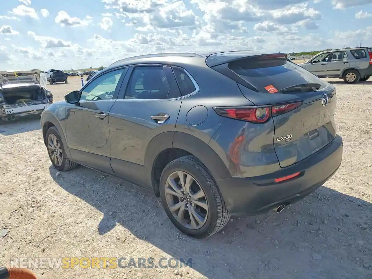 2 fotografías del automóvil dañado 3MVDMBCM7PM569997 MAZDA CX30 2023