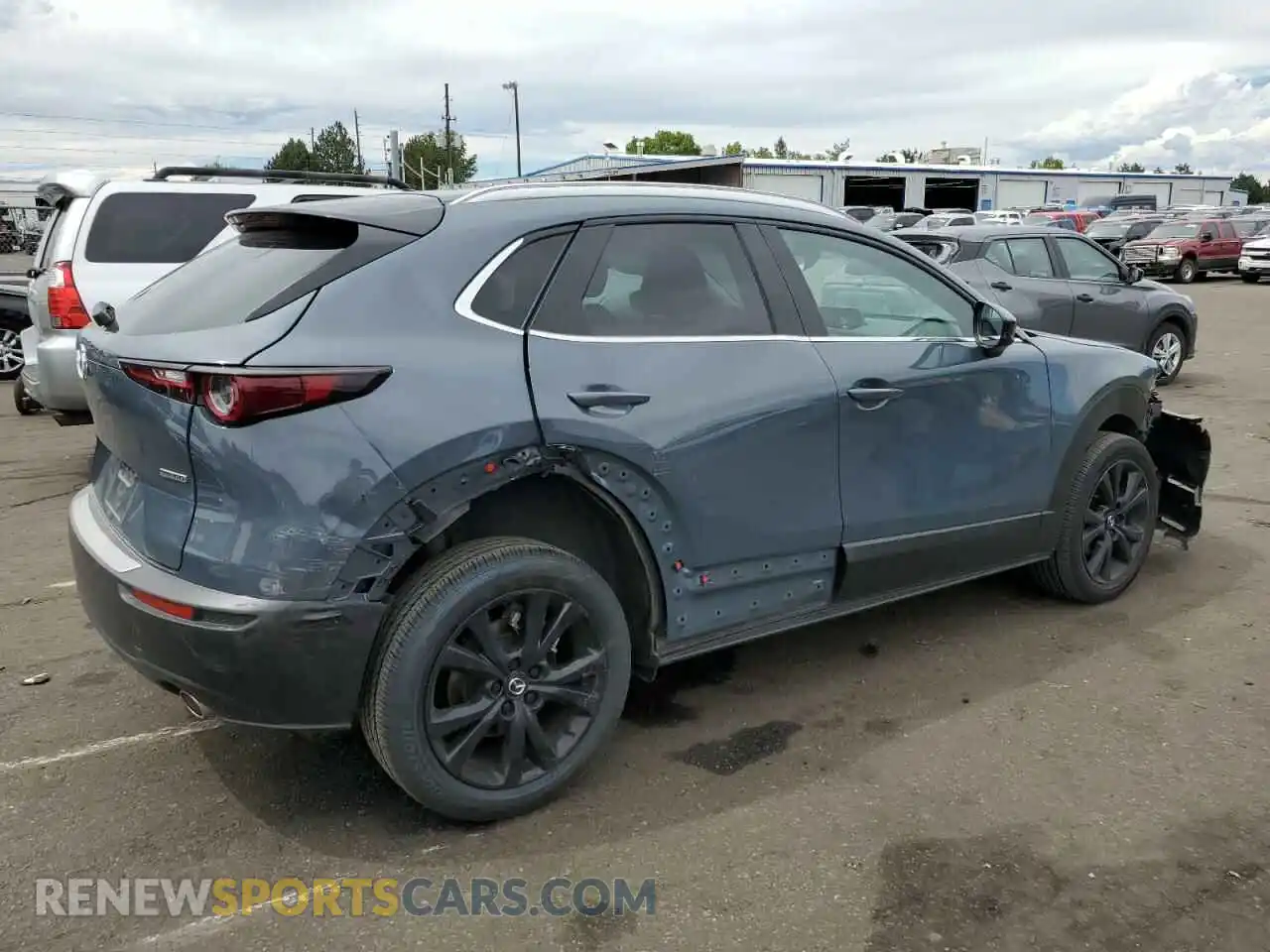 3 Photograph of a damaged car 3MVDMBCM7PM570969 MAZDA CX30 2023