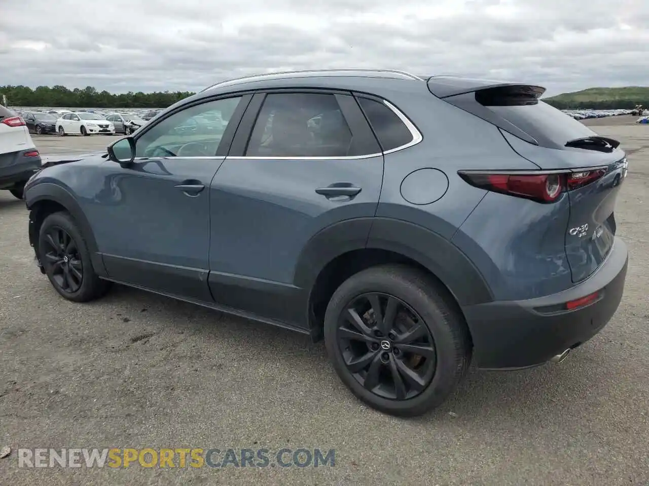 2 Photograph of a damaged car 3MVDMBCM8PM510182 MAZDA CX30 2023