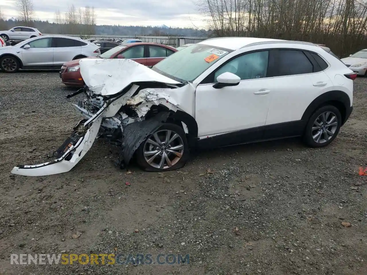1 Photograph of a damaged car 3MVDMBCM8PM522199 MAZDA CX30 2023