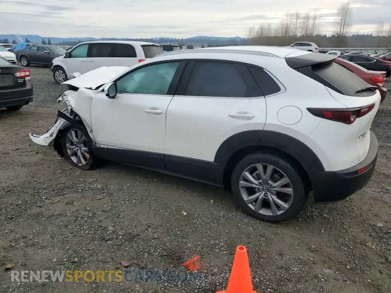 2 Photograph of a damaged car 3MVDMBCM8PM522199 MAZDA CX30 2023