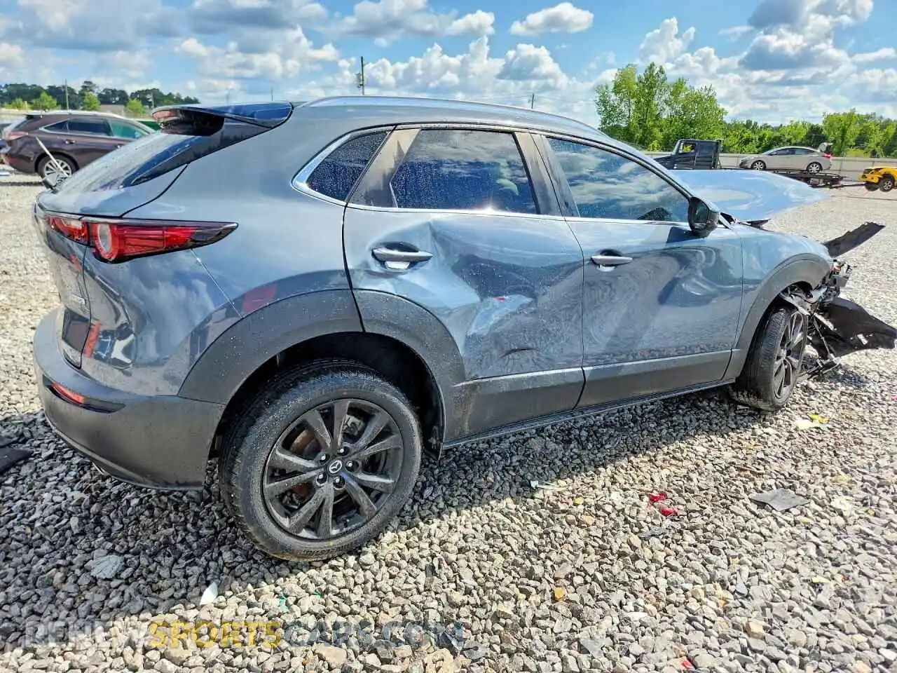 3 Фотография поврежденного автомобиля 3MVDMBCM8PM527080 MAZDA CX30 2023