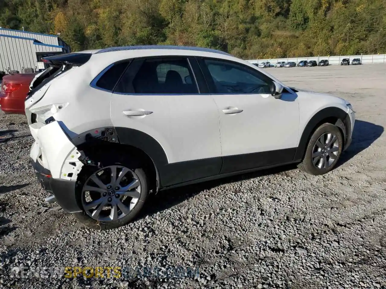 3 Photograph of a damaged car 3MVDMBCM8PM552724 MAZDA CX30 2023