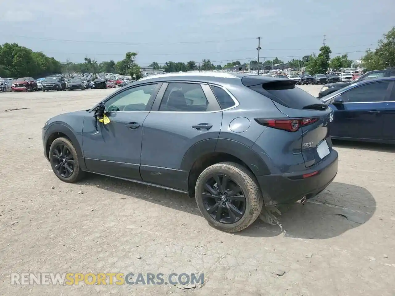 2 fotografías del automóvil dañado 3MVDMBCM8PM565604 MAZDA CX30 2023