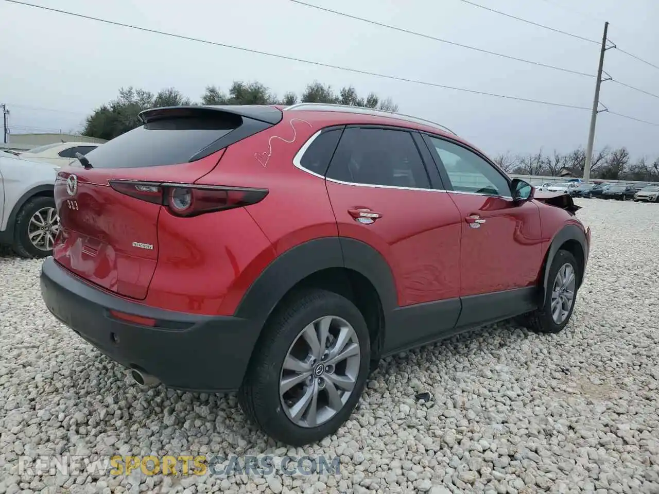 3 Photograph of a damaged car 3MVDMBCM8PM576604 MAZDA CX30 2023
