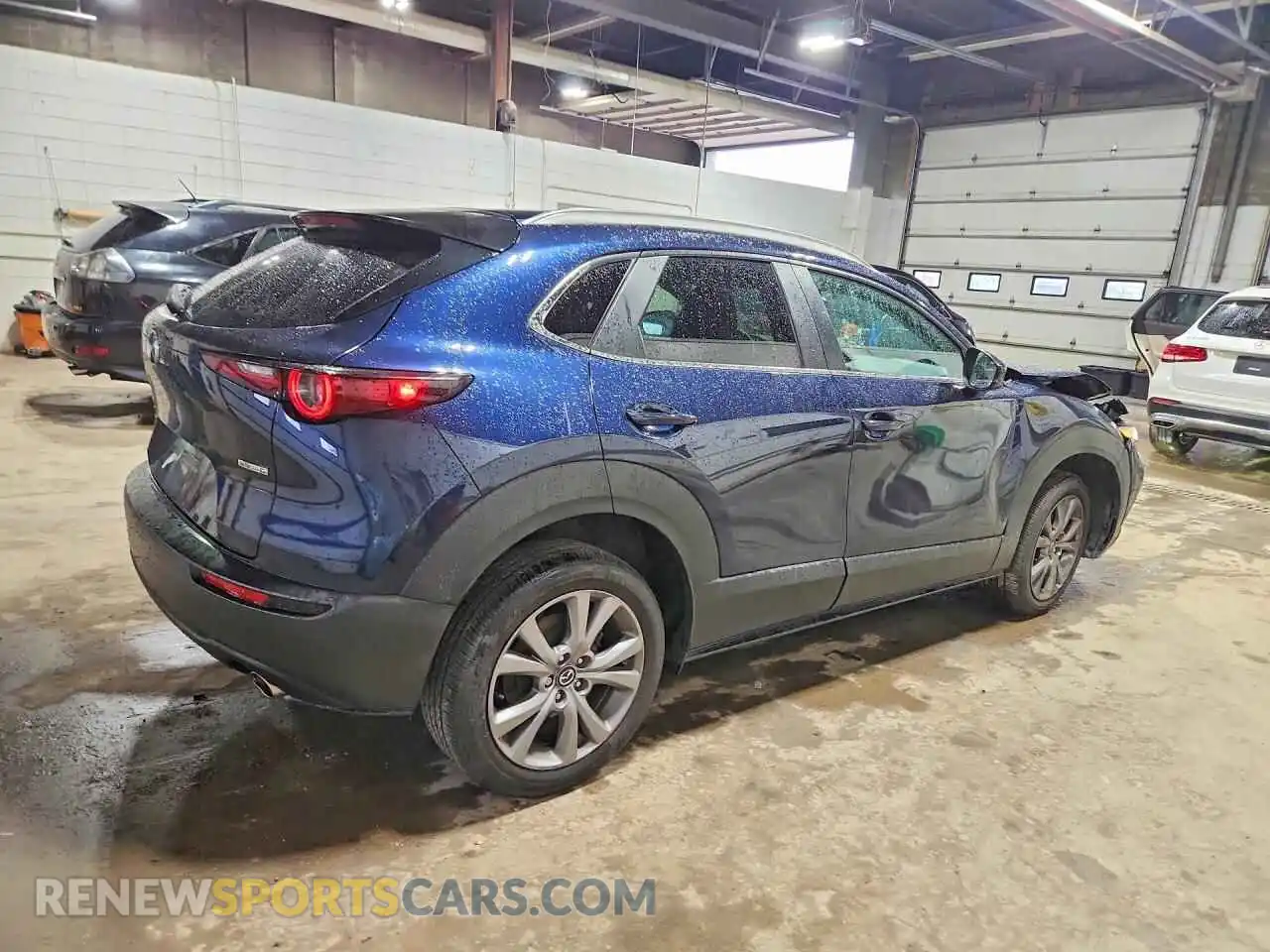 3 Photograph of a damaged car 3MVDMBCM9PM502771 MAZDA CX30 2023