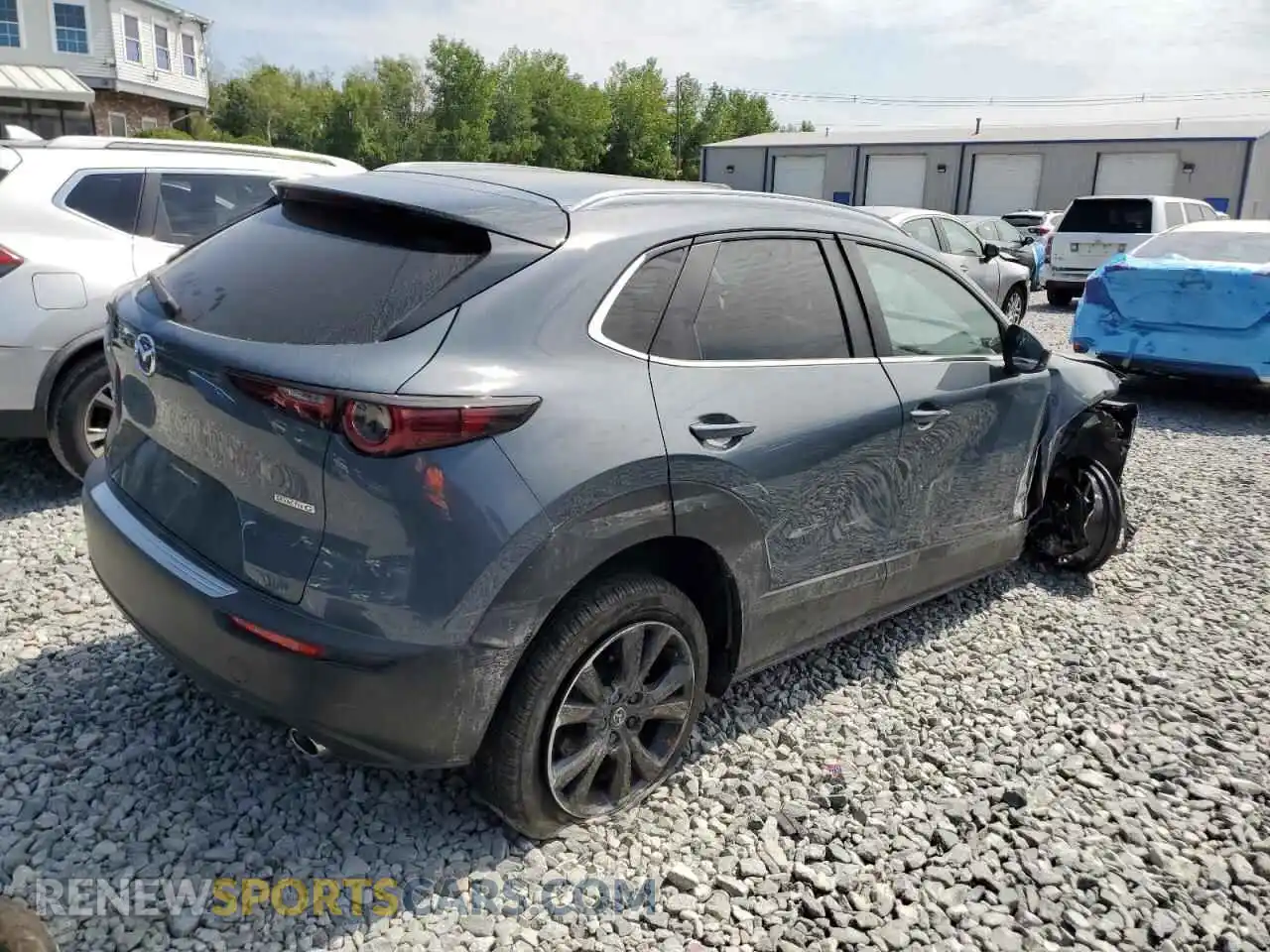 3 Photograph of a damaged car 3MVDMBCM9PM557642 MAZDA CX30 2023