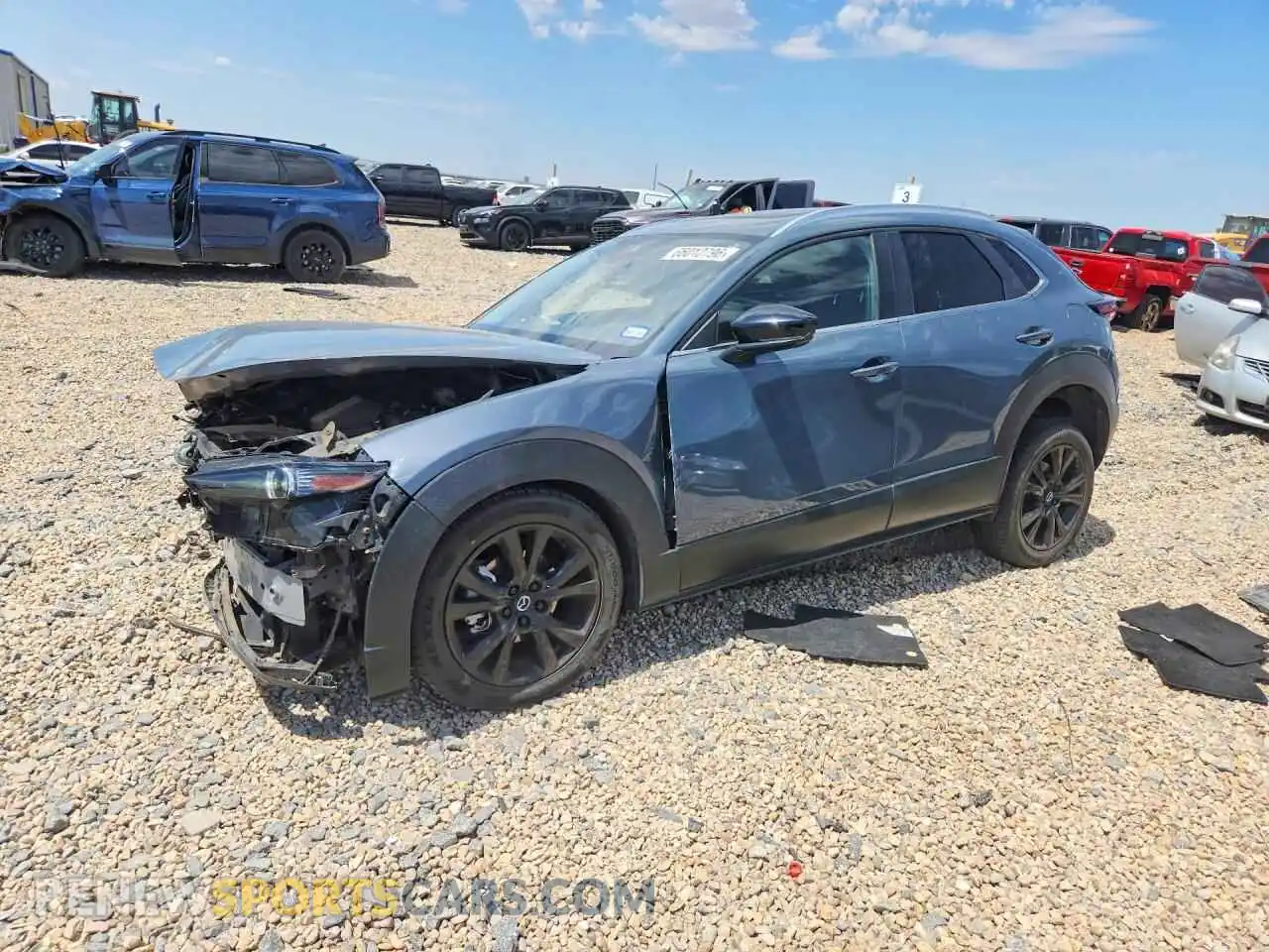 1 Photograph of a damaged car 3MVDMBCM9PM567328 MAZDA CX30 2023