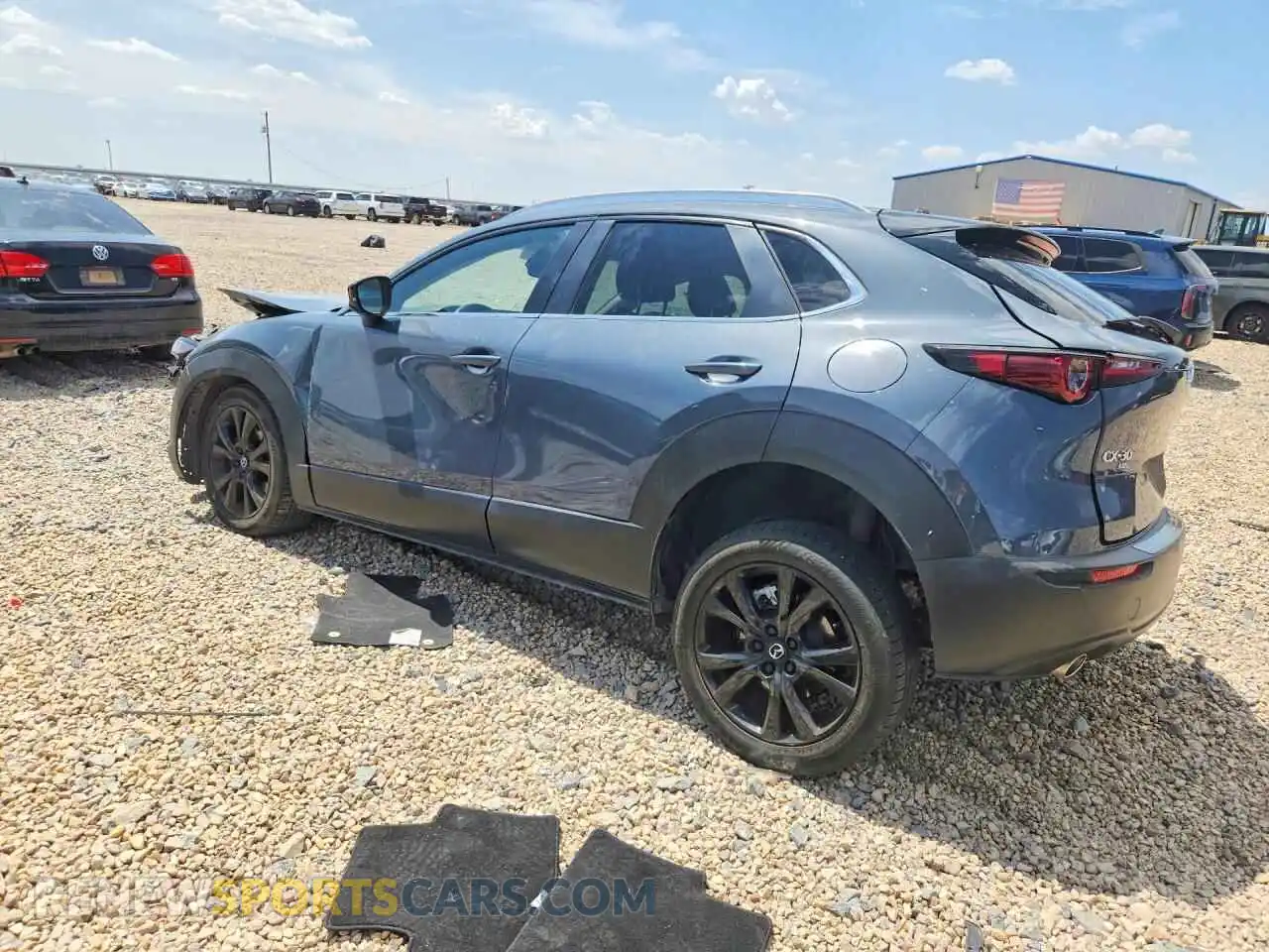 2 Photograph of a damaged car 3MVDMBCM9PM567328 MAZDA CX30 2023
