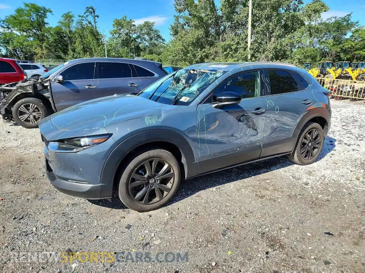 1 Photograph of a damaged car 3MVDMBCM9PM571685 MAZDA CX30 2023